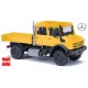 MB Unimog U 5023 cabine double à plateau court jaune