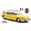 Citroen DS break (1969) jaune à toit blanc perle avec galerie et antenne