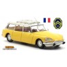 Citroen DS break (1969) jaune à toit blanc perle avec galerie et antenne