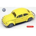 VW Cox 1200 jaune avec pneus à flanc blanc